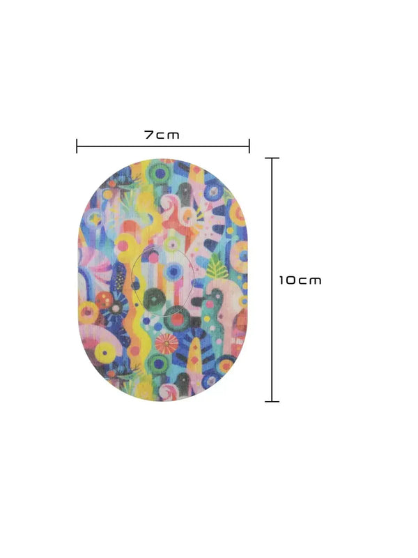 Colorful Dexcom G7 sensor patch with childhood-inspired design, measuring 7cm by 10cm, from the Patch Me UP! Childhood Memories collection.