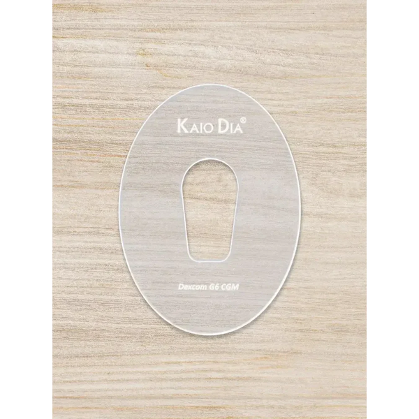 CGM Sensor Patch Template Kaio-Patch on wooden background.