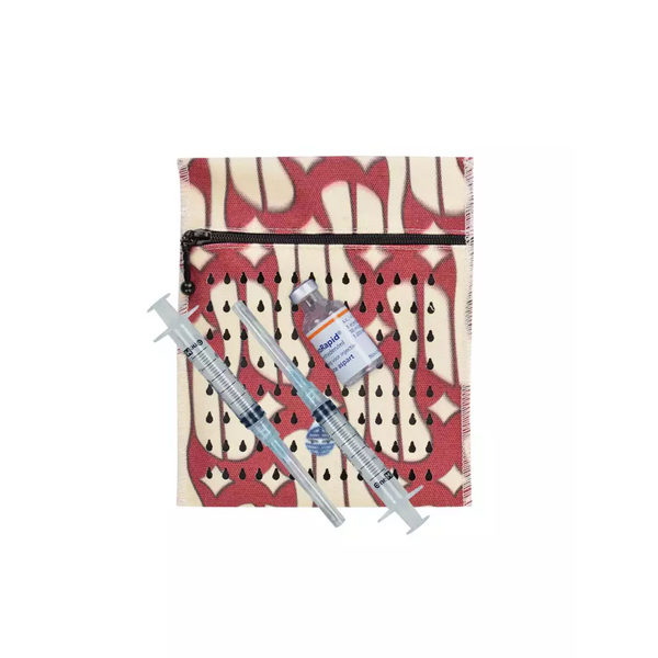 Insulin cooling wallet for vials with red pattern design, compact and travel-friendly.