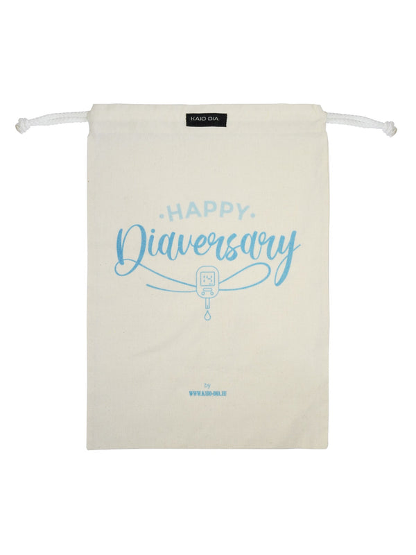 Kaio-Dia Diaversary Shoe Bag with 'Happy Diaversary' design, front view showing drawstring closure. Durable cotton material with light blue diabetes-inspired print.