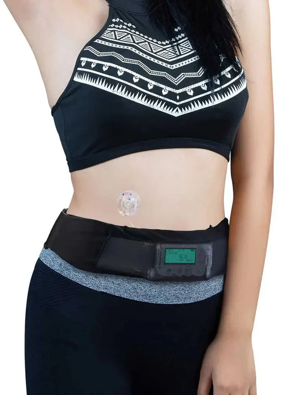 Insulin pump belt with mesh window displaying device screen, worn by a person in athletic wear.