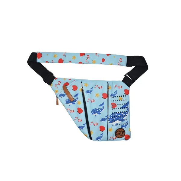 Children's shoulder bag with cooling system for insulin storage, blue with marine animal prints, compact and adjustable strap.