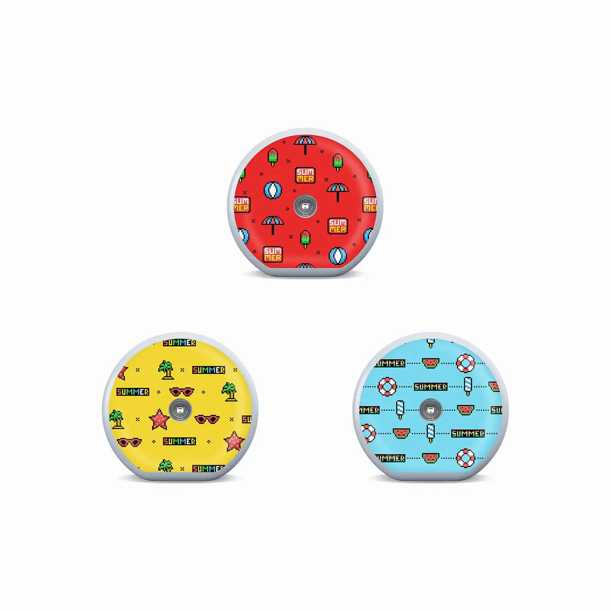Three Accu-Chek SmartGuide sensor stickers in red, yellow and blue pixel-art designs with playful summer icons. Image
