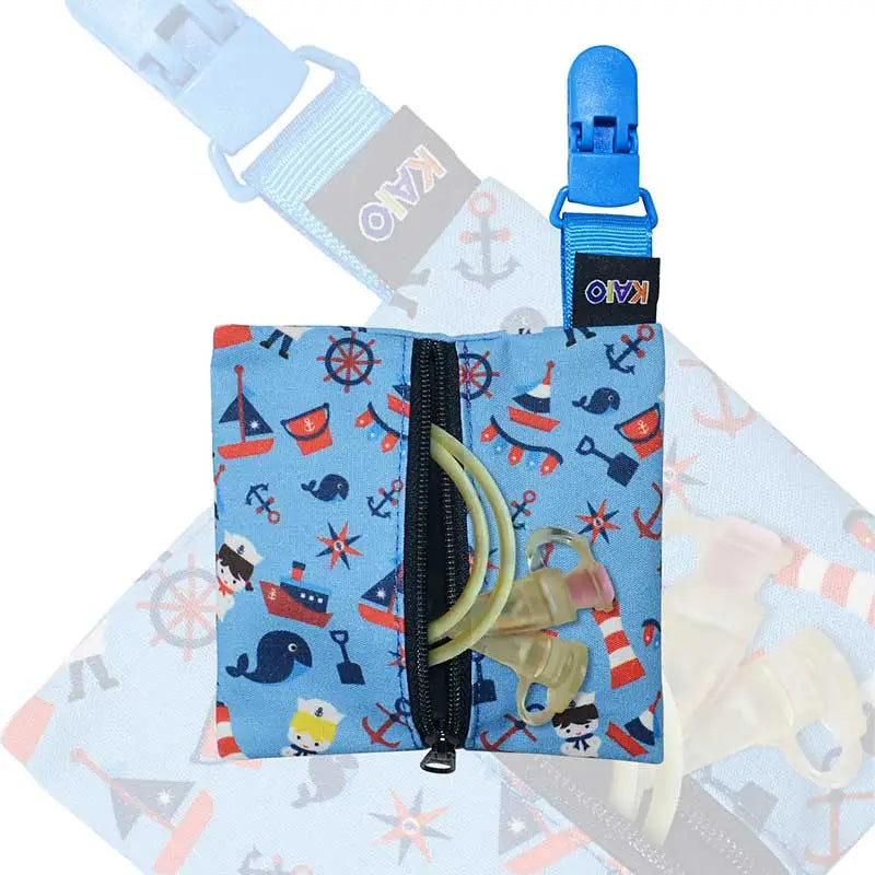 Kaio-Tube Pouch for children's medical tubing, a compact blue fabric pouch with a nautical print and black zipper. Image
