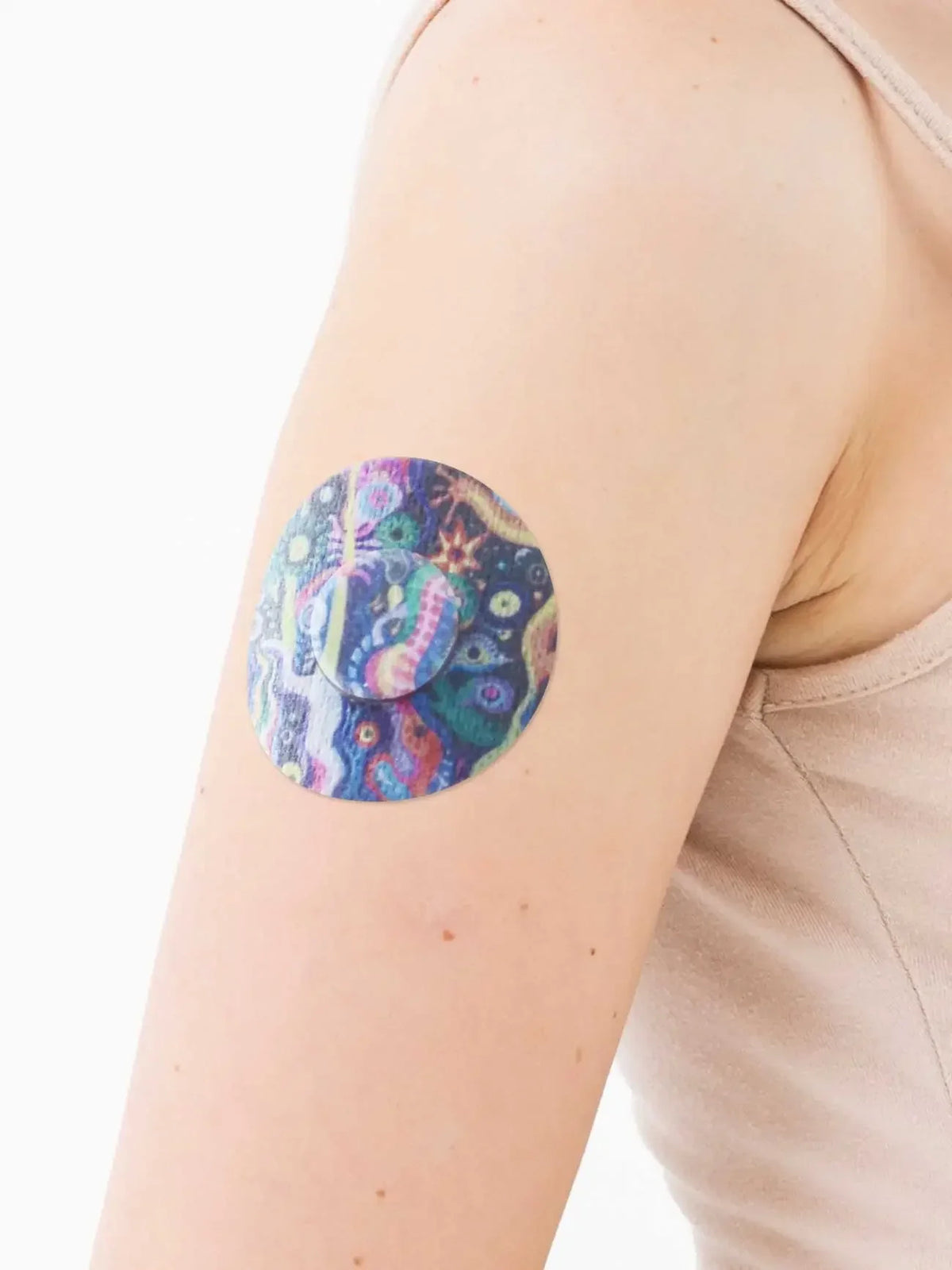 FreeStyle Libre 3 adhesive patch, Lucid Echo design, on the arm