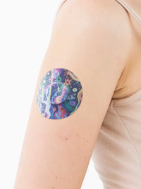 FreeStyle Libre 3 adhesive patch, Lucid Echo design, on the arm