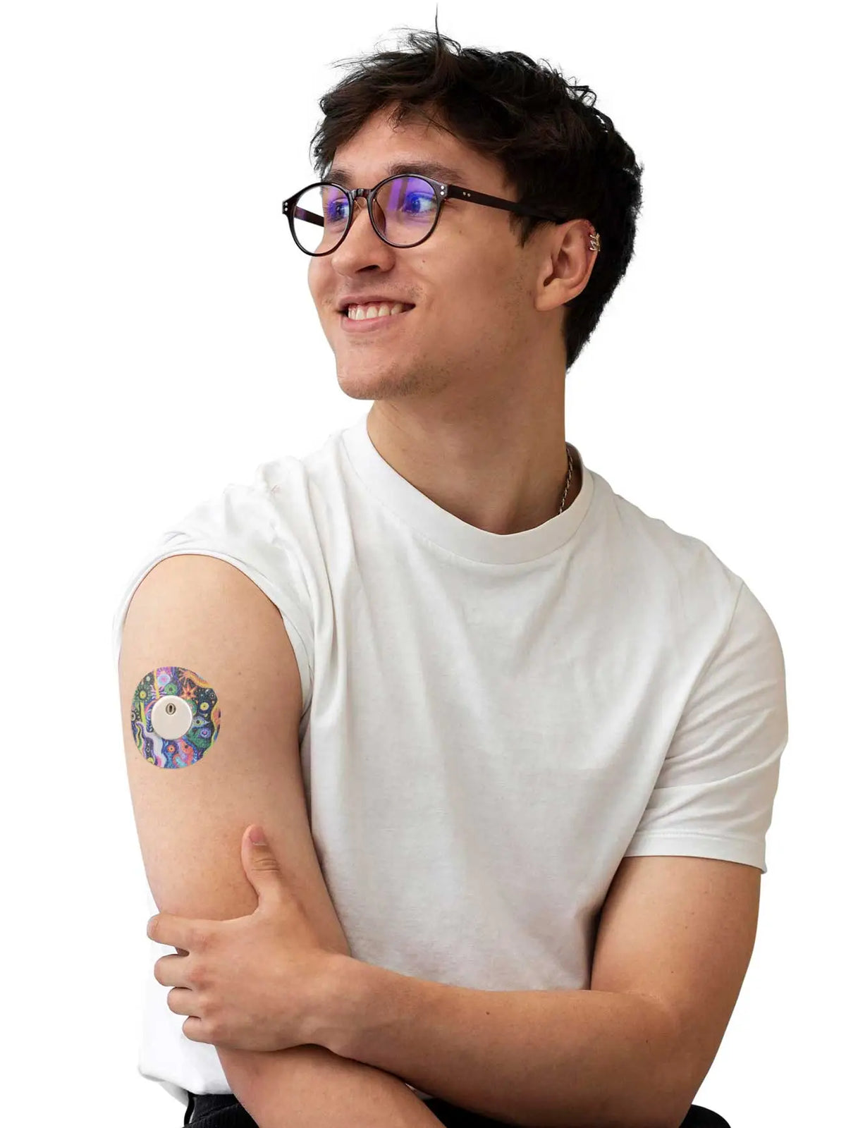 FreeStyle Libre 3 adhesive patch, Lucid Echo design, worn on the arm by a man