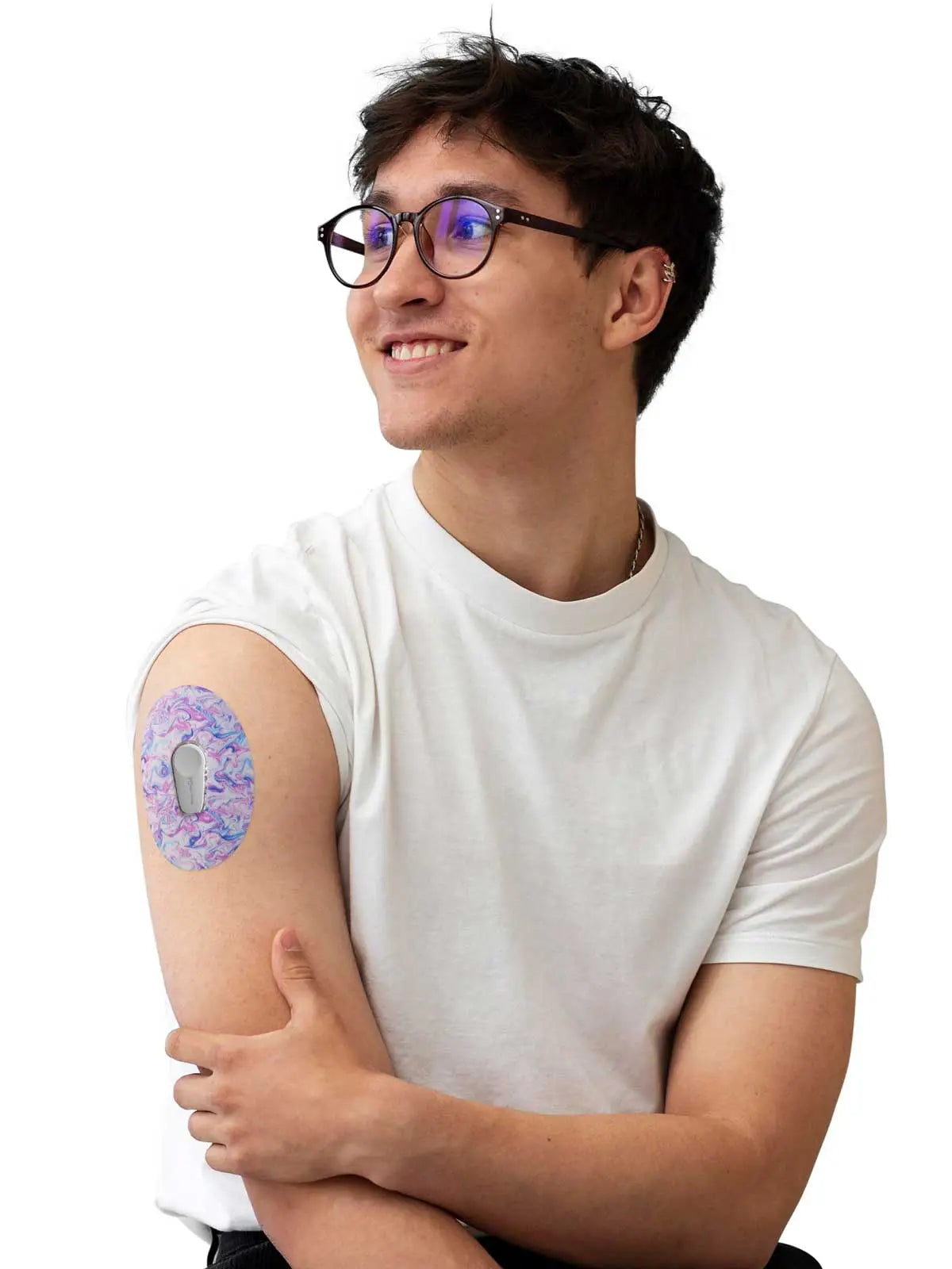 Dexcom G6 adhesive patch, Spring Series, worn on the arm by a man