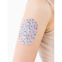 Dexcom G7 adhesive patch, Spring Series, on the arm, close-up