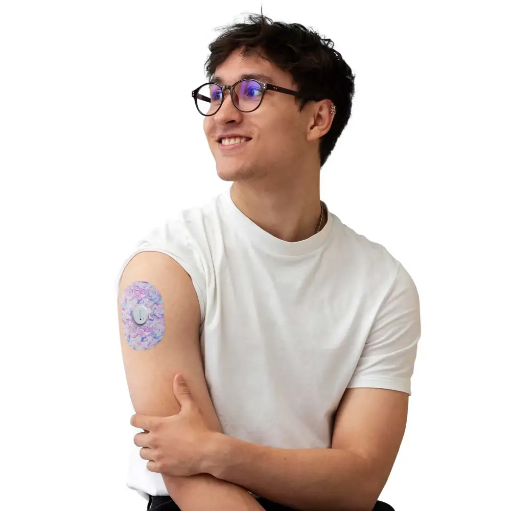 Dexcom G7 adhesive patch, Spring Series, worn on the arm by a man