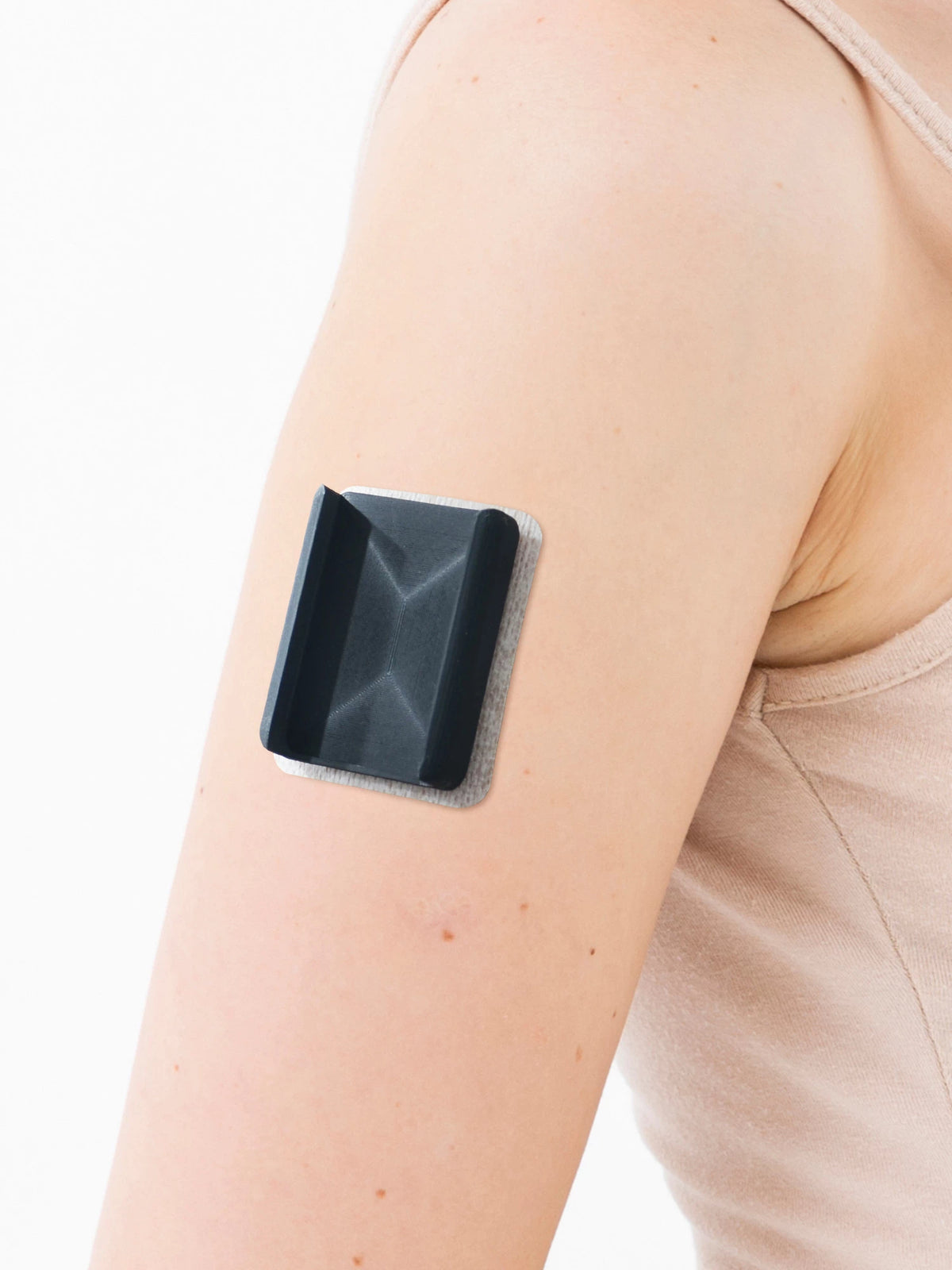 Tandem Mobi pump in the Dia-Mobi Clip on the arm, before the patch is applied