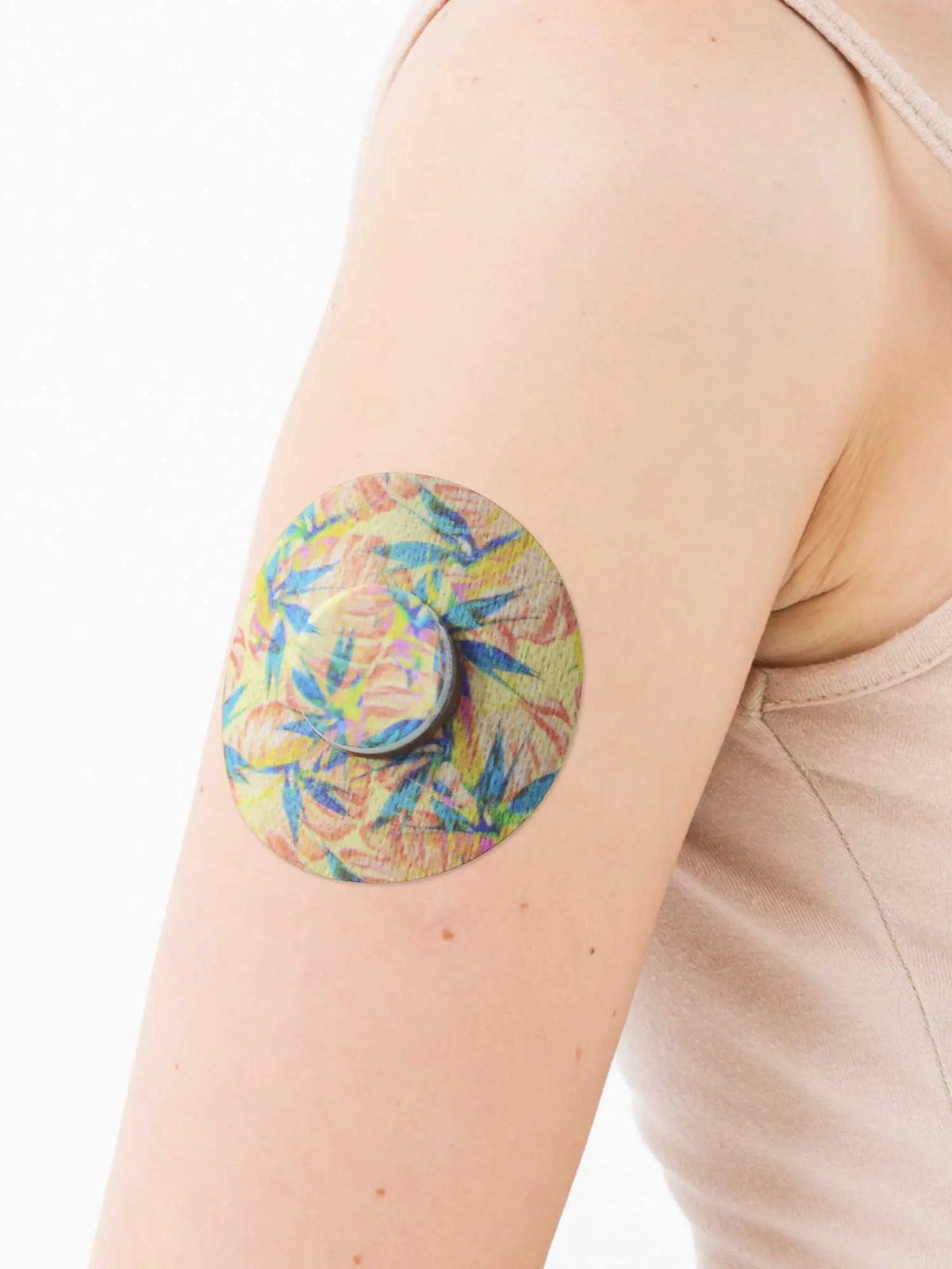 Freestyle Libre 2 Tequila Sunrise patch worn on arm breathable adhesive CGM patch for active lifestyle and secure sensor hold