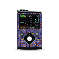 Medtronic MiniMed Insulin Pump with Halloween Edition Stickers featuring pumpkins and bats.