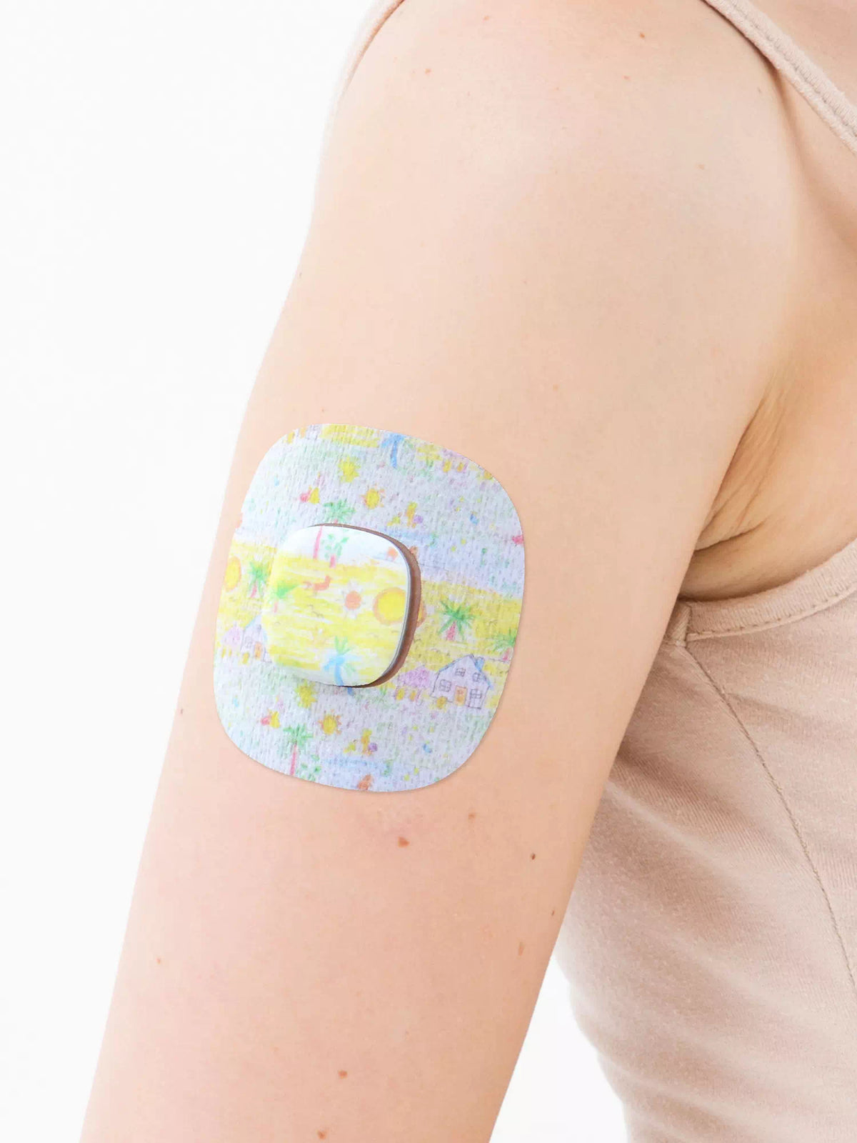 Simplera Sync adhesive patch, Childhood Memories design, on the arm