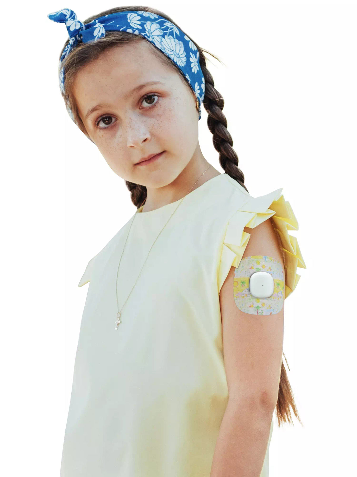 Simplera Sync adhesive patch, Childhood Memories design, worn by a girl