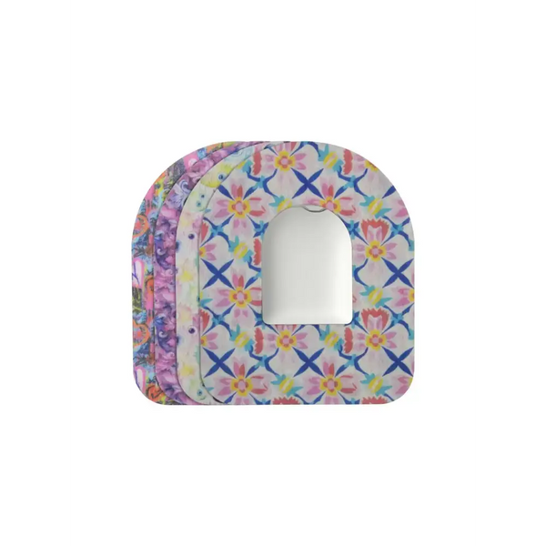 Omnipod Dash adhesive patches in vibrant spring designs for secure insulin pump placement.