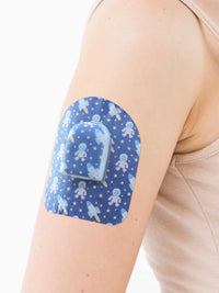 Omnipod pod adhesive patch, Astronaut design, on the arm