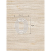 CGM sensor patch template for precise patch cutting on wooden surface.