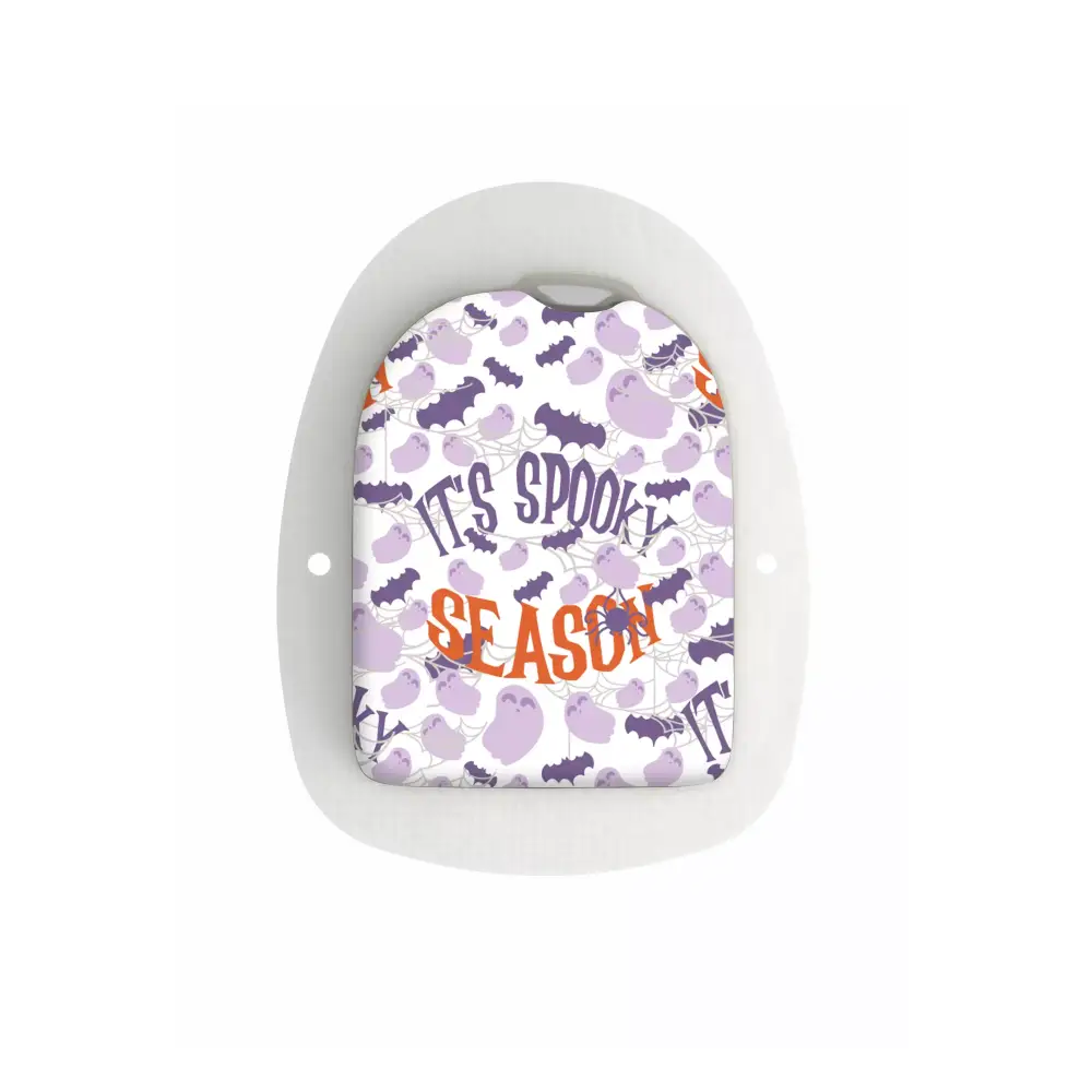 Omnipod Stickers - 'It's Spooky Season' theme featuring bats and Halloween text in purple and orange.
