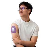 Omnipod pod adhesive patch, Spring Series, worn on the arm by a man