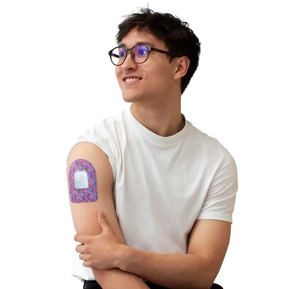 Omnipod pod adhesive patch, Spring Series, worn on the arm by a man