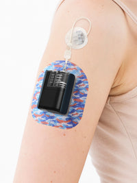 Tandem Mobi adhesive patch, Flow Camo design, over the Dia-Mobi Clip on the arm