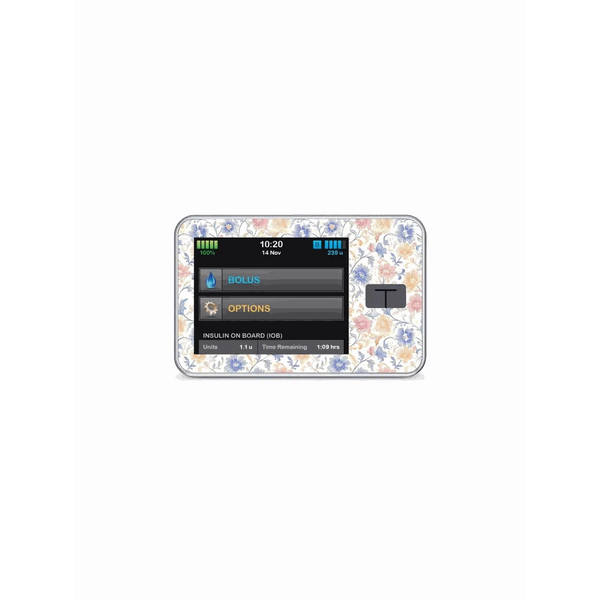 Tandem T-Slim insulin pump with floral vinyl sticker, Spring Edition 2025.