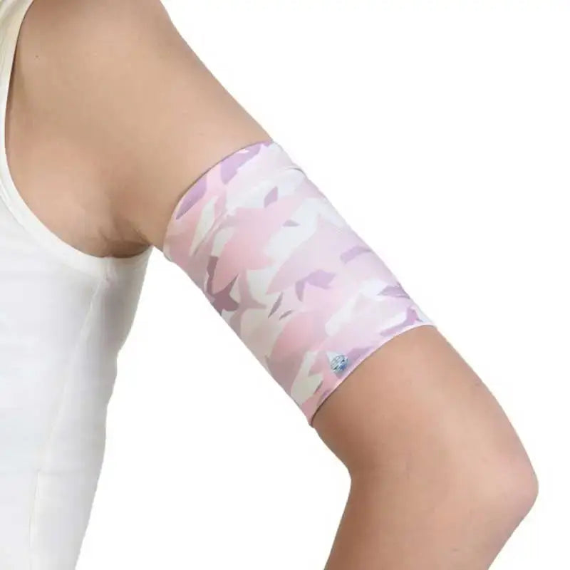 Glucose sensor armband in sea and beach design for secure and comfortable use.