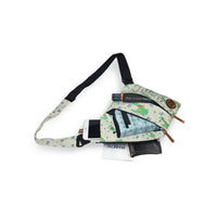 Shoulder bag with cooling system for children, designed for active diabetics, featuring space for insulin pens, glucose meter, and personal items, with adjustable strap and fun printed fabric.