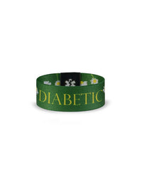Reversible green diabetes awareness wristband with "Diabetic" and daisy print.