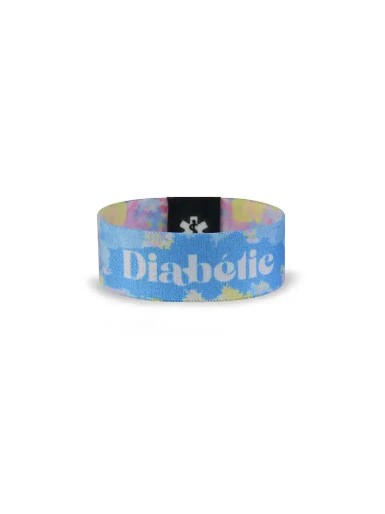 Reversible diabetes awareness wristband in vibrant summer colors displaying "Diabetic" text.