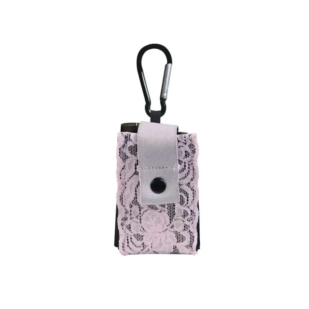 Lace insulin pump pouch with carabiner for secure attachment.