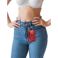 Lace insulin pump pouch clipped to jeans for discreet and stylish diabetes management.